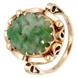 Vintage 14K. yellow gold ring set with carved jade with floral details.