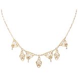 18K. Yellow gold Art Nouveau necklace with elegant filigree links set with seed pearls.