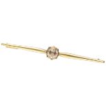 Vintage 14K. yellow gold bar brooch set with a rose cut diamond.