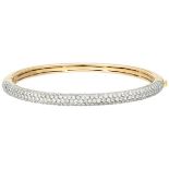 18K. Yellow gold bangle bracelet set with approx. 3.11 ct. diamond.