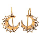 Antique 18K. yellow gold moon shaped earrings set with seed pearls.
