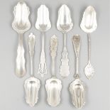 7-piece lot sugar scoops silver.