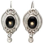 Antique 835 silver earrings set with jet and a gold-colored detail of a flower.