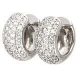 18K. White gold earrings set with approx. 0.90 ct. diamond.