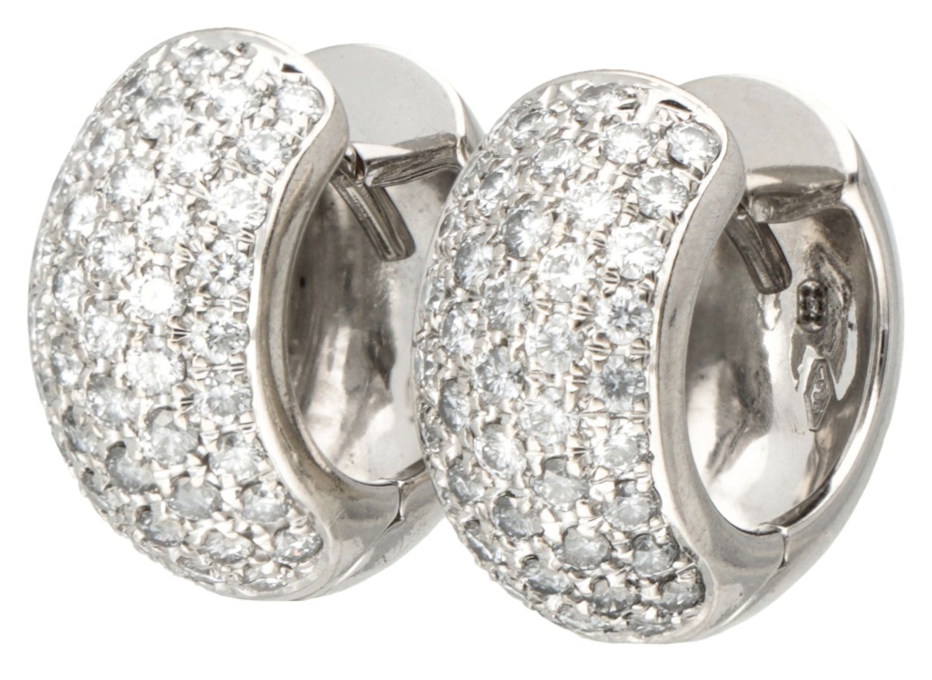 18K. White gold earrings set with approx. 0.90 ct. diamond.