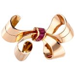 18K. Rose gold bow-shaped retro brooch set with synthetic ruby.