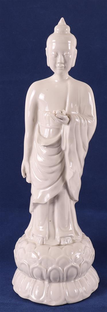 A blank de Chine standing Buddha on a lotus crown, China, 20th C