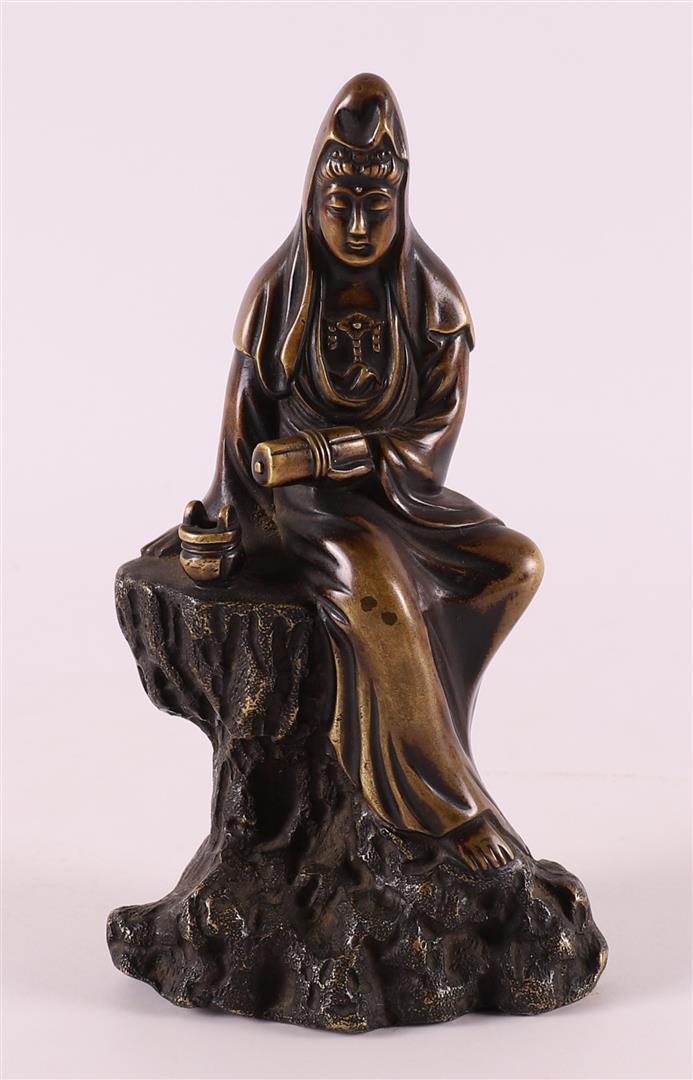 A brown patinated bronze Kwan Yin, China 19th century.