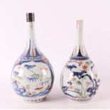 Two various porcelain Imari point or pipe bottles, Japan, around 1700.