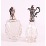 A clear crystal odeur flask with silver flip lid and frame, 19th C.