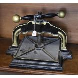 A cast iron book press with rotary mechanism, 19th century.