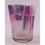 A purple/iridescent glass pleated vase, design & execution: Edith Hagelstange.