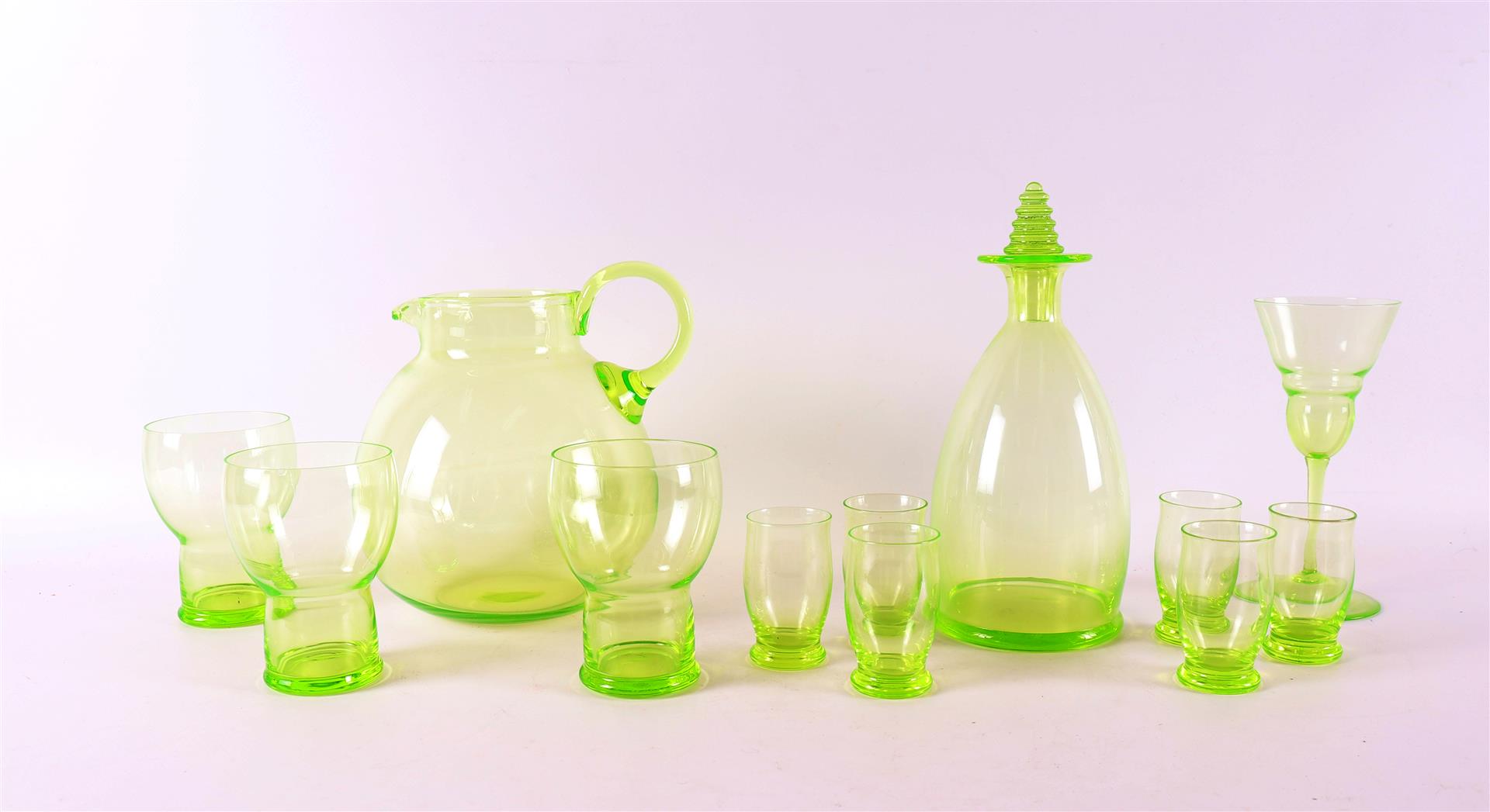 An anna green glass decanter 'Chartreuse' with six glasses, 1936