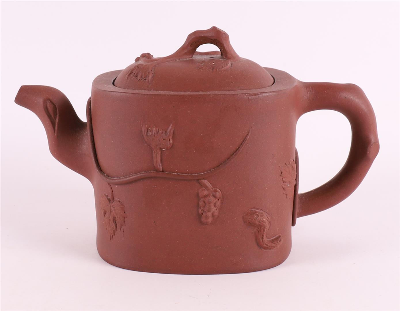 A Yixing tree trunk shaped teapot, China 19th/20th century.