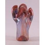 A purple/iridescent glass pleated vase, design & execution: Edith Hagelstange.