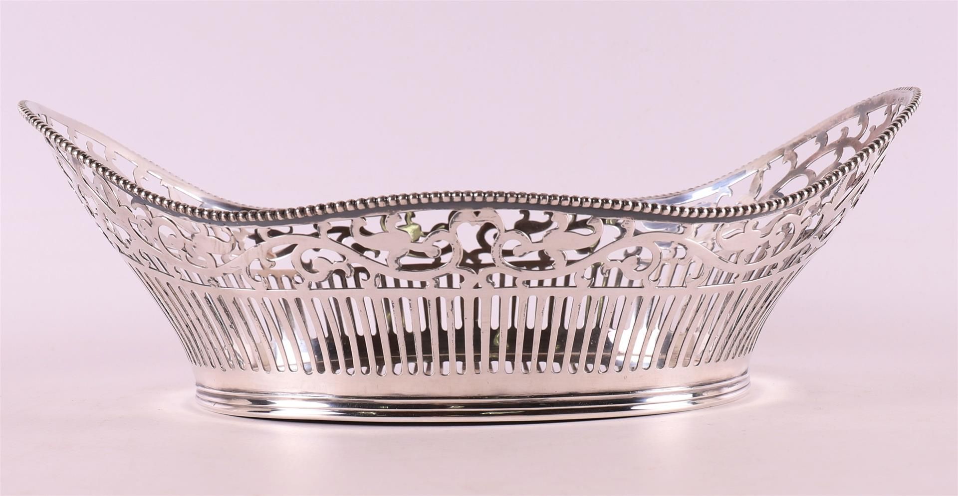 An ajour 2nd grade silver bread basket with pearl rim. - Image 2 of 2