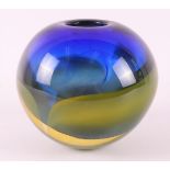 A blue/yellow clear glass unique vase, design and execution: Willem Heesen.