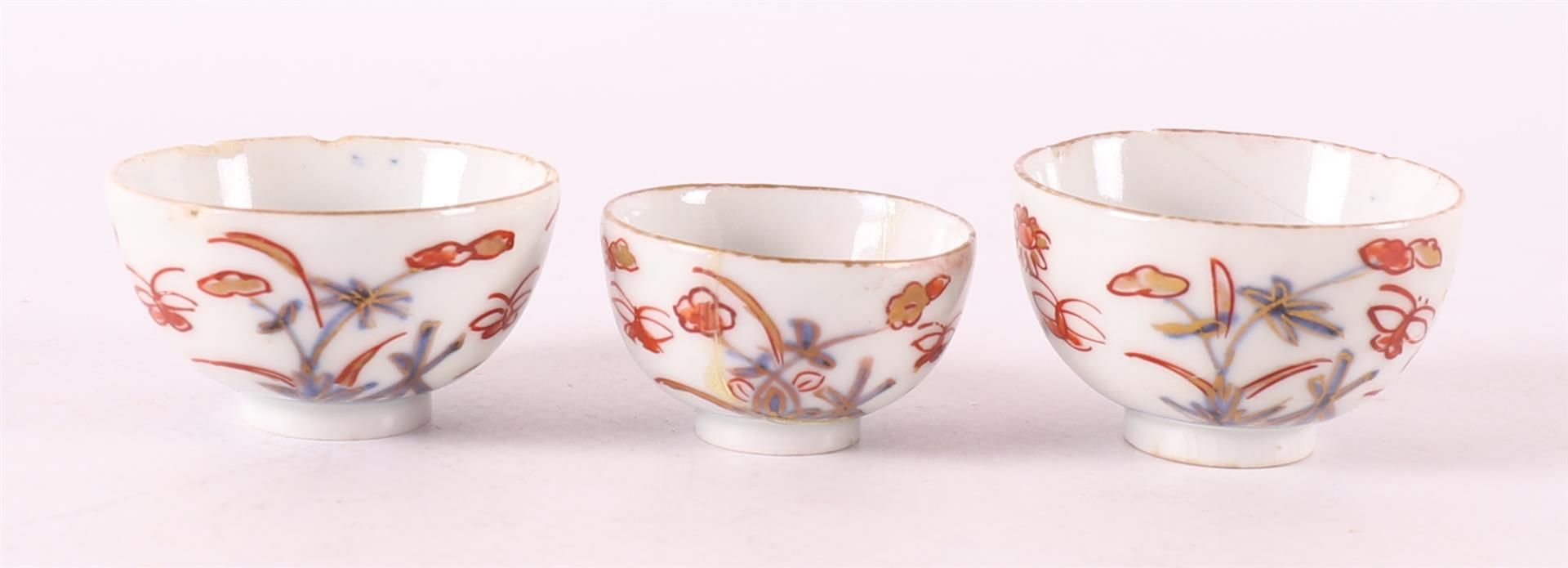 Three various porcelain Imari miniature bowls and saucers, Japan, Edo - Image 7 of 14