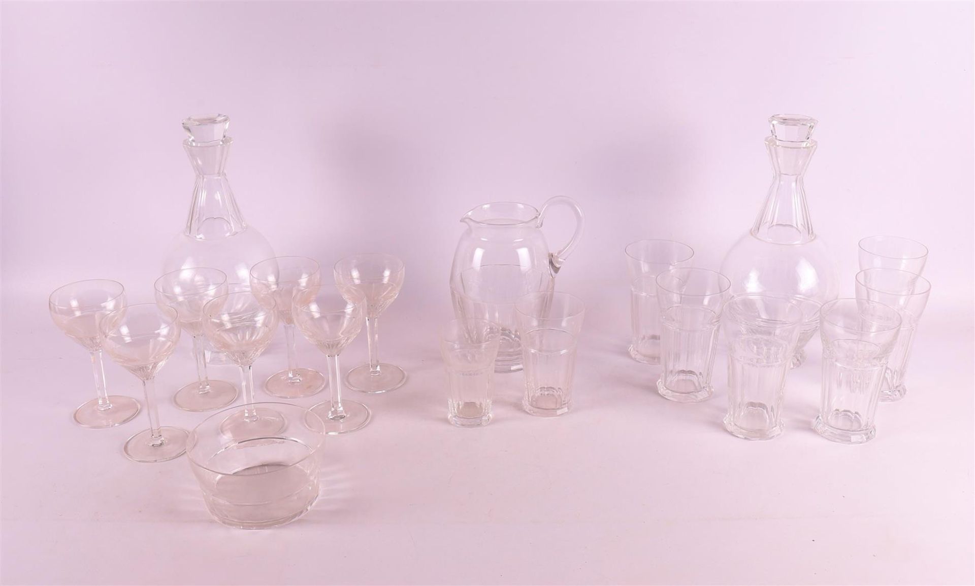 A clear glass decanter 'Spectrum' with six accompanying glasses, 1929