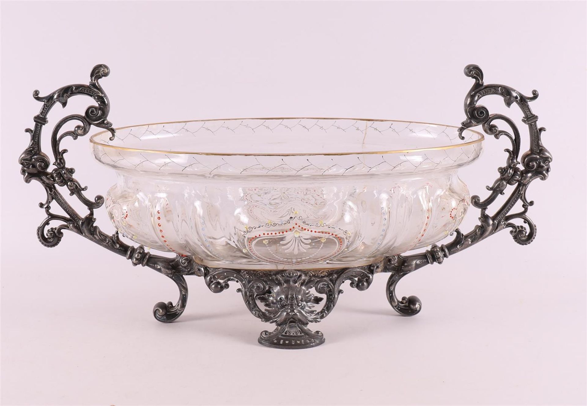 A glass fruit bowl in a pewter frame, 19th century.