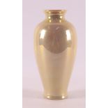 A yellow luster glaze earthenware vase, St. Lukas Utrecht, ca.1910.