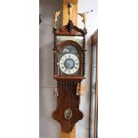 A double hooded tail clock with date and moon indication, 1st half 19th century.