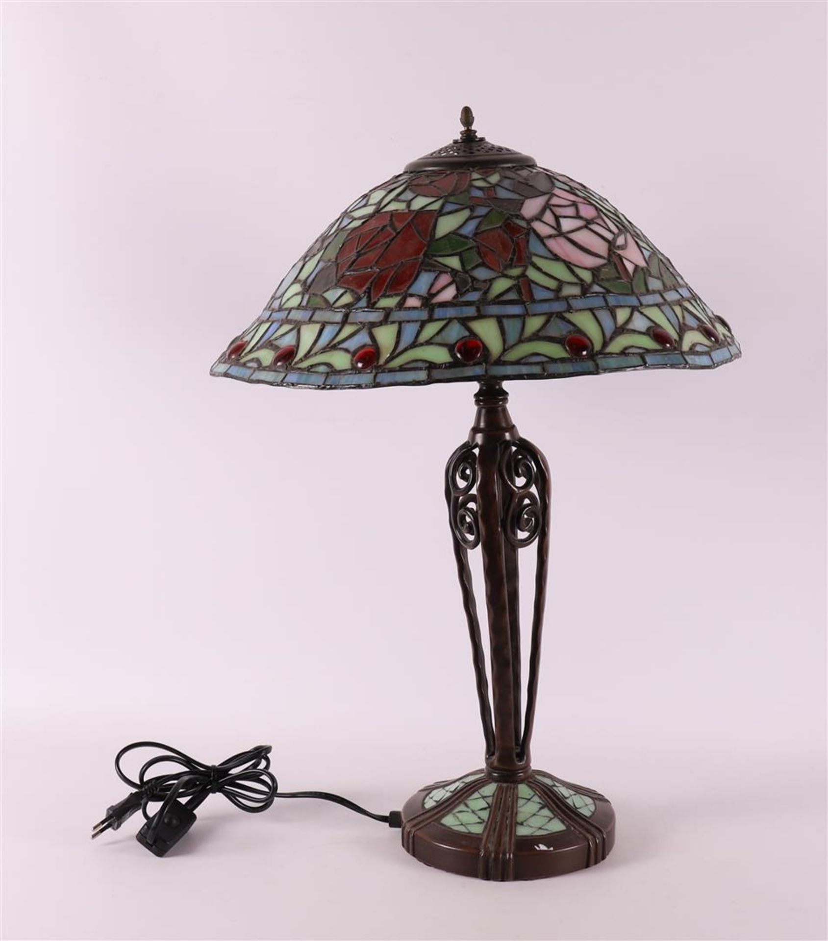 An ajour table lamp, Tiffany style, 20th century.