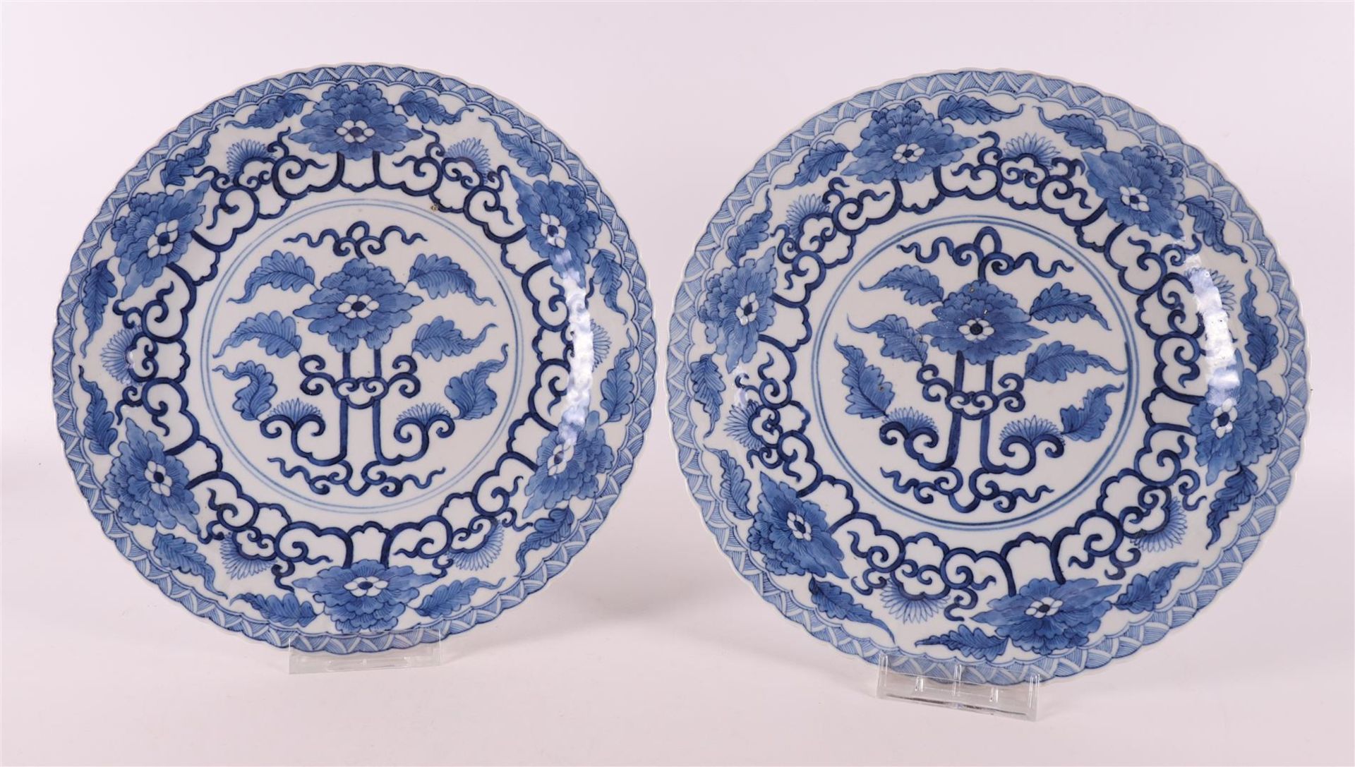 A pair of blue and white porcelain contoured dishes, China, 19th C.
