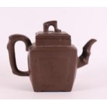 A dark brown Yixing teapot, China 19th century.