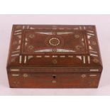 A rosewood lidded box, around 1900..