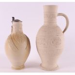 Two gray stoneware jugs, including a bearded man's jug, Germany, 20th century