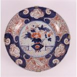 A porcelain Imari dish, Japan, circa 1700.