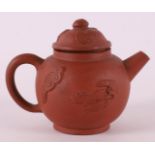 A brown Yixing spherical teapot, China, 18th/19th C.