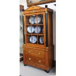 An Empire style single door display cabinet, 2nd half 19th century.