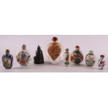 A lot of various snuff bottles, including red coral, 20th century.