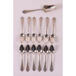 A series of twelve silver Art Deco teaspoons and tea spoon, 1916.