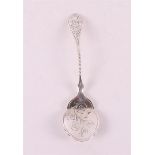A 2nd grade silver pie shovel, hammered floral decor, 19th century.