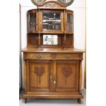 A sideboard with display case, early 20th century.