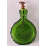 A green glass odeur falcon, Bohemia, 20th century.