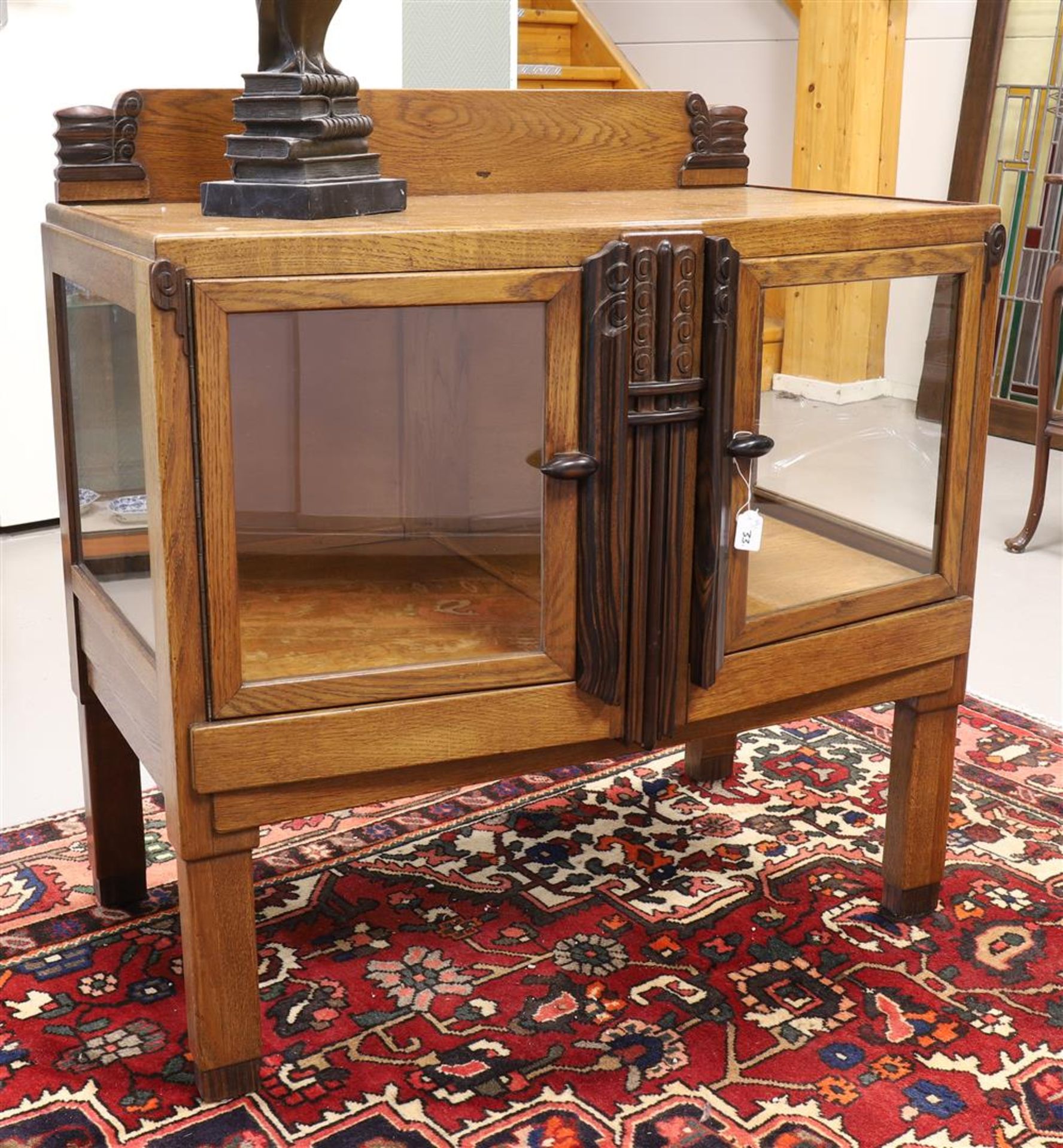 An Amsterdam school tea furniture with an uprising, ca. 1915.