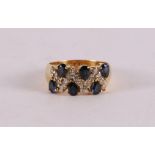 An 18 kt gold band ring with 6 blue sapphires and 16 diamonds
