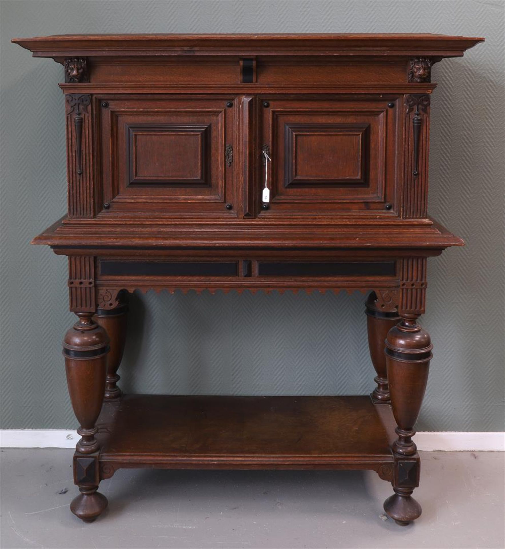 A cabinet with panel doors in the upper cabinet, Renaissance style, around 1900