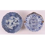 A blue/white porcelain dish with loose silver handle, China, Kangxi.