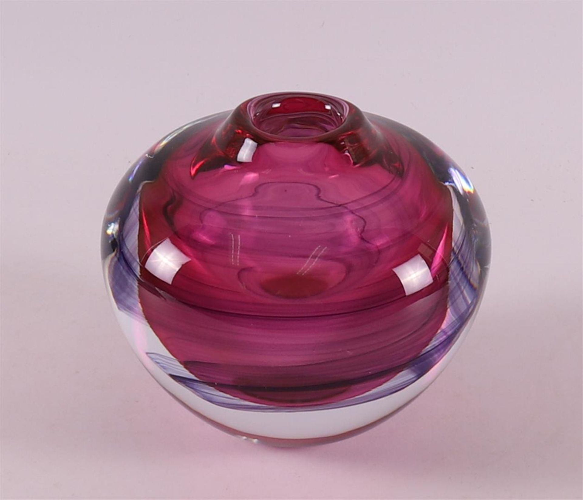 A purple clear glass studio glass vase, signed: Strömbergshyttan.