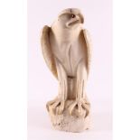 An alabaster sculpture of a bird of prey, ca. 1930.