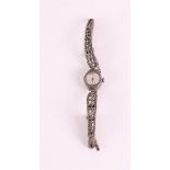 A women's wristwatch with silver case and strap, marked: Ancre.