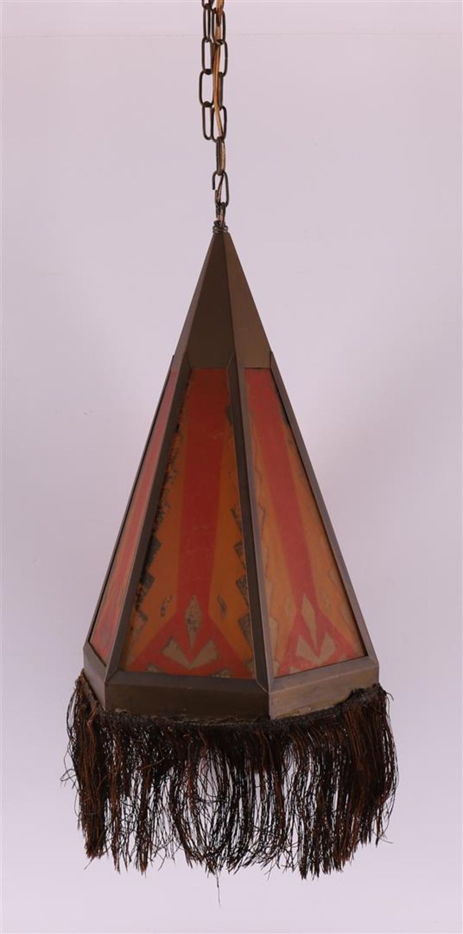 A conical glass-in-copper Amsterdam School hanging lamp with fringe, ca. 1910.