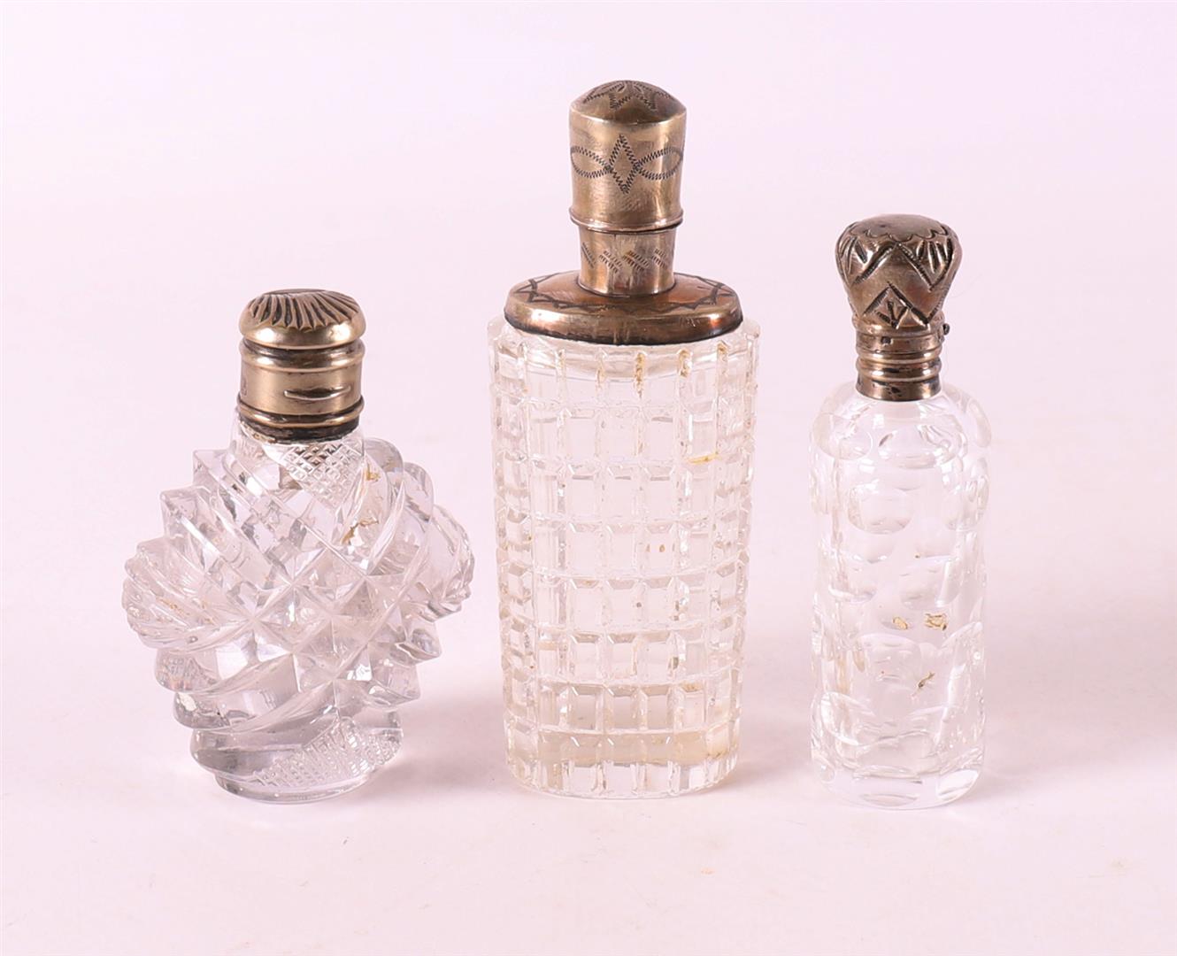 Three assorted odeur flasks with silver mounts, 19th century