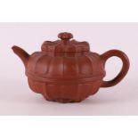 A brown Yixing pumpkin-shaped teapot, China, 18th/19th C.