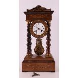 A walnut mantel clock, France, Napoleon Trois, ca. 1870.
